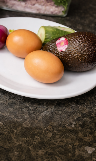 Avocado and parsley prepared for avocado egg toast