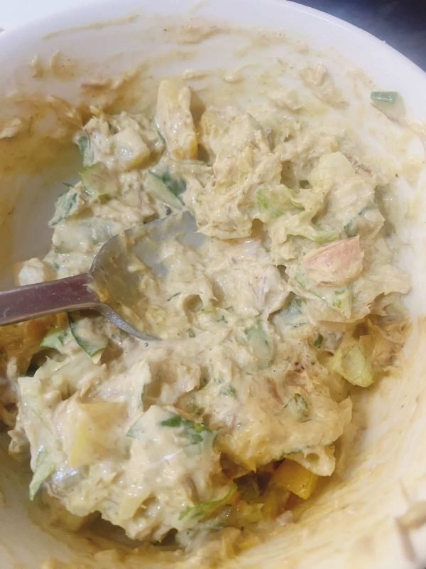 Creamy mackerel rillettes mixture with vegetables and mayonnaise in a bowl ready for sandwich filling