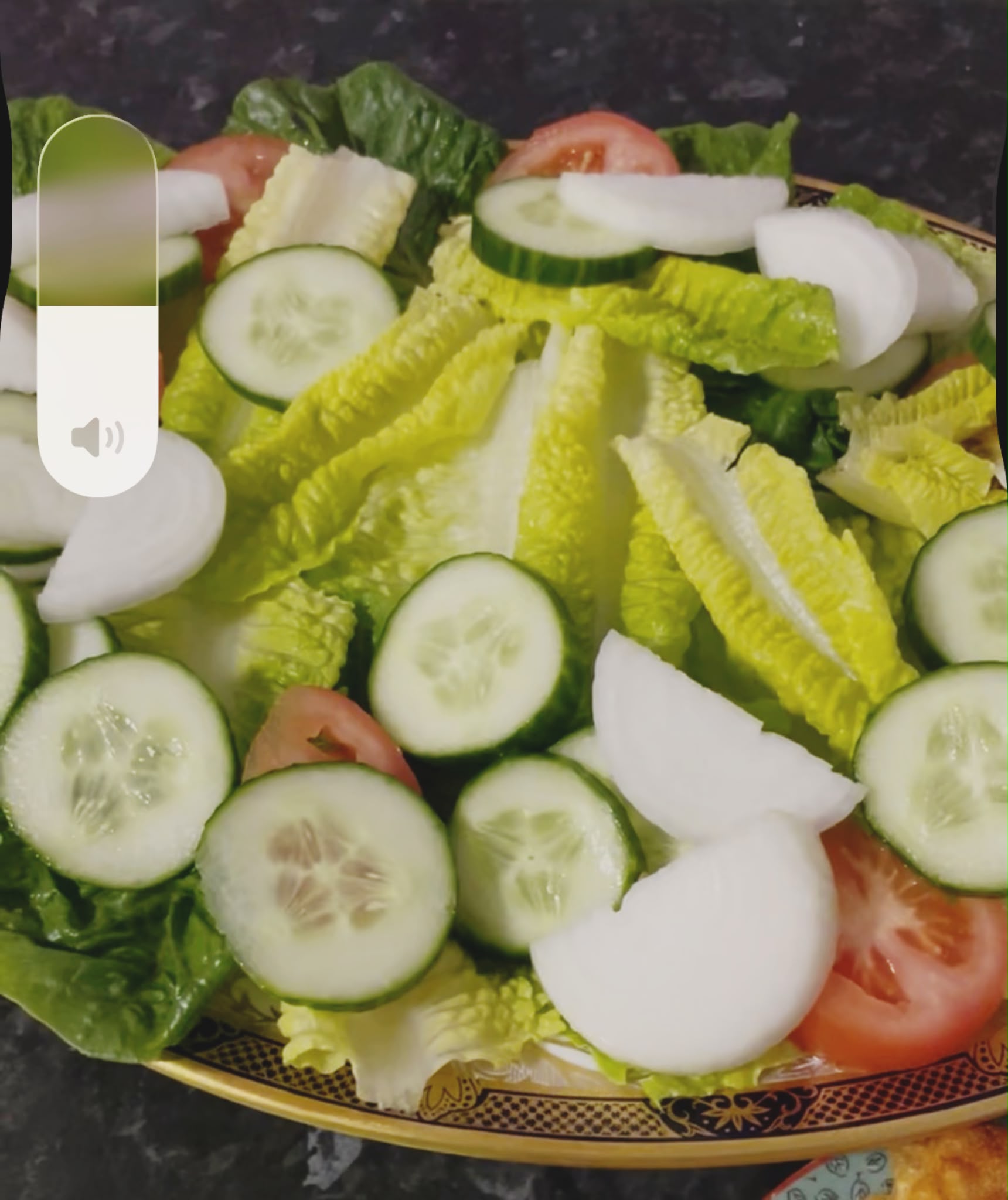 Fresh lettuce cucumber tomatoes red pepper and onion for chicken and prawn salad