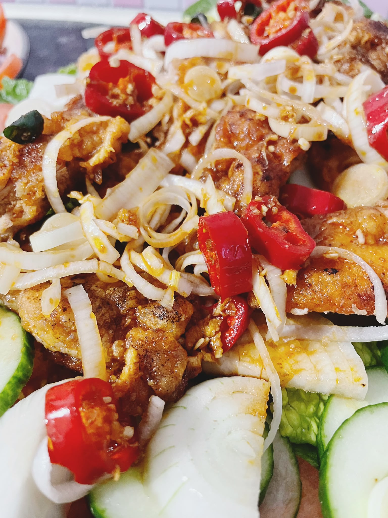 Crispy chicken and prawn salad with sweet chilli soy sauce and fresh vegetables