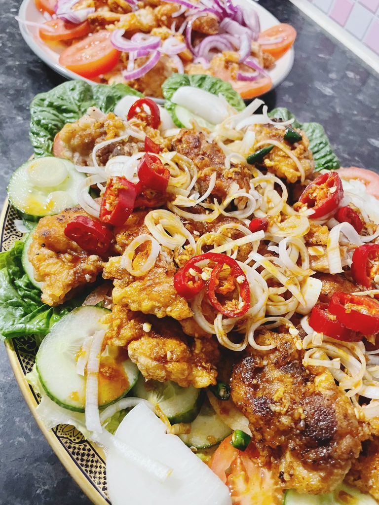 Crispy chicken and prawn salad with sweet chilli soy sauce and fresh vegetables
